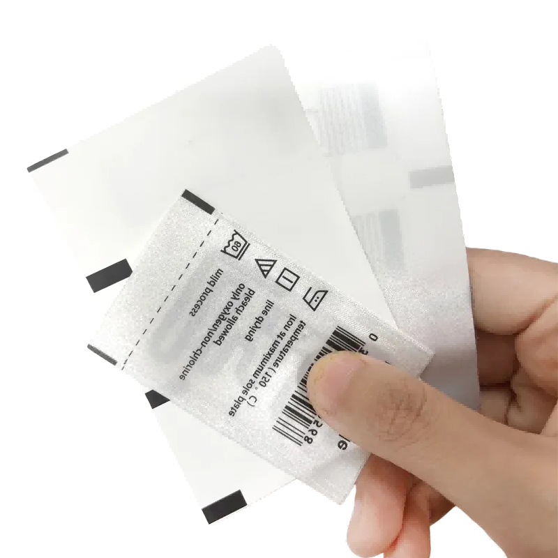 RFID textile label embedded chip and antenna structure for garment tracking