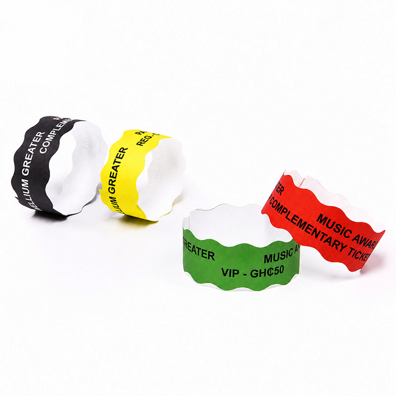 Disposable Tyvek wristbands with adhesive closure and tamper-evident security cuts